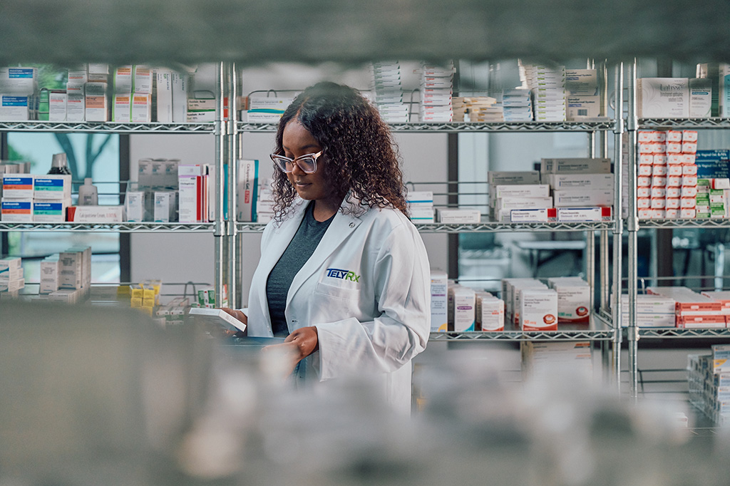 A TelyRx pharmacy tech packaging a "pick and pack" medication at our Dallas pharmacy.