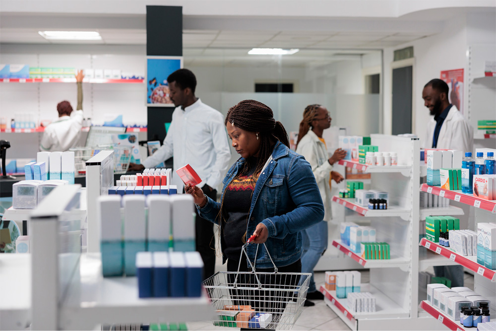 A woman examines the ingredients of an Rx skincare product.