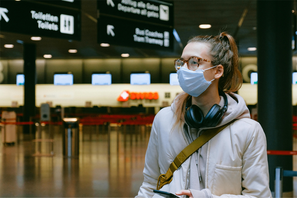 A traveler waiting at an airport terminal.