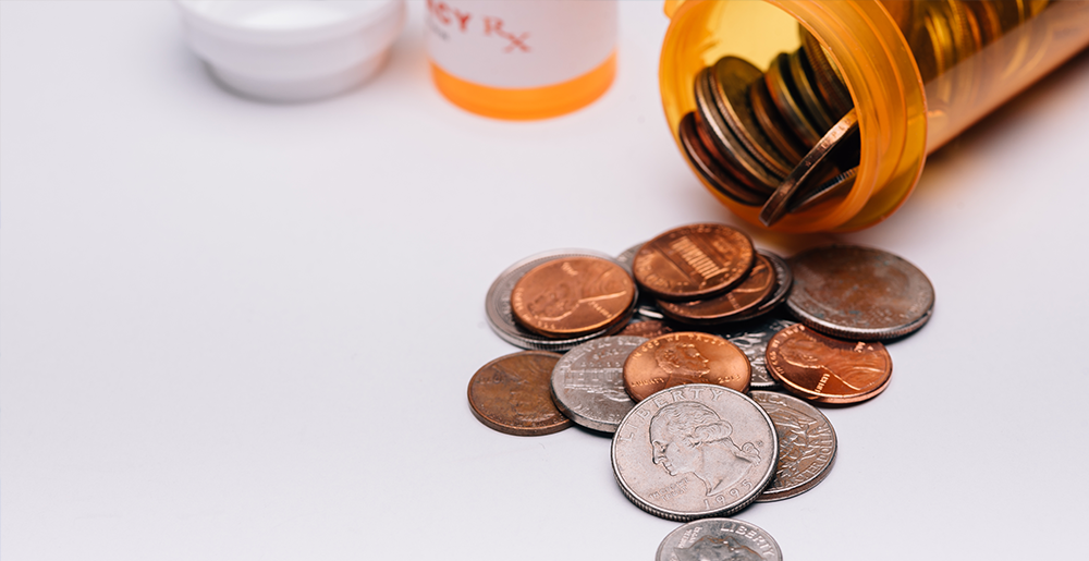 Recycled pill bottles are used to store loose pocket change.