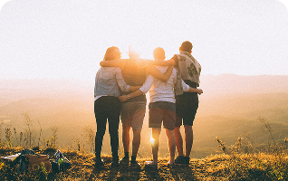 Group of friends smiling together outdoors